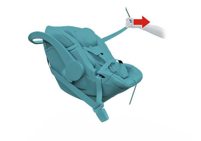 2026 Kia Tasman Child Restraint System securing image. A child safety seat is highlighted in teal, and a hand pulls the shoulder belt with a red arrow pointing to the right. Explains the function of removing slack from the seat belt to firmly secure the child restraint system.