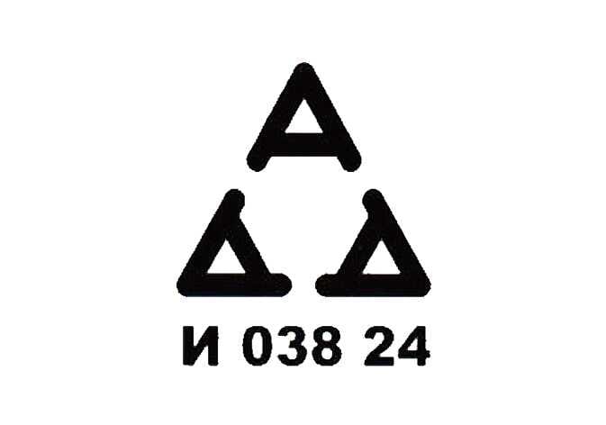 2026 Kia Tasman declaration of conformity symbol image. The image displays a certification mark consisting of three black triangles arranged in a pyramid shape, with the code 'И 038 24' printed below. It indicates compliance with specific regional radio frequency regulations.