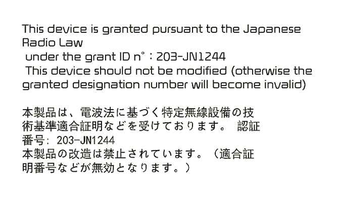 2026 Kia Tasman Japanese Radio Law conformity label image. It displays the grant ID '203-JN1244' and text in English and Japanese regarding Radio Law compliance and modification warnings. Explains the radio compliance information.