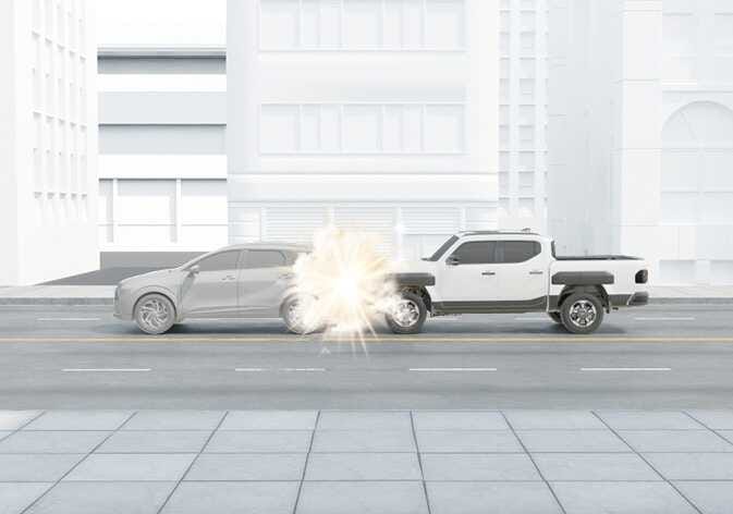 2026 Kia Tasman frontal collision air bag inflation condition image. A white pickup truck collides with the side of a grey SUV, with an explosion graphic at the front bumper indicating the impact point. Explains the conditions where front air bags are designed to inflate during a frontal collision.