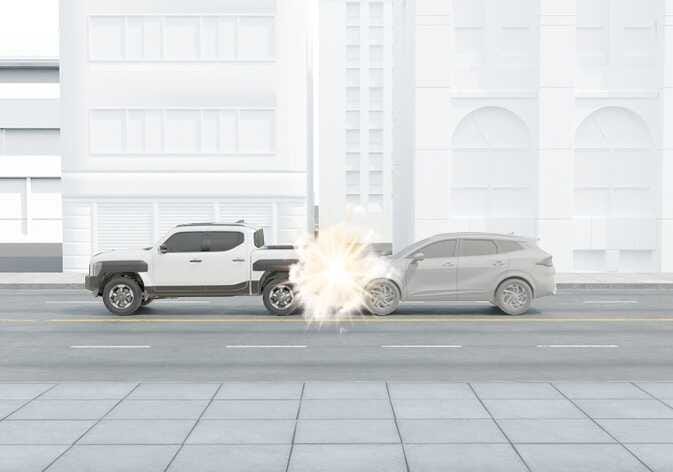 2026 Kia Tasman rear collision image. A vehicle impacts the rear of the white truck. Illustrates that airbags do not inflate in rear collisions.