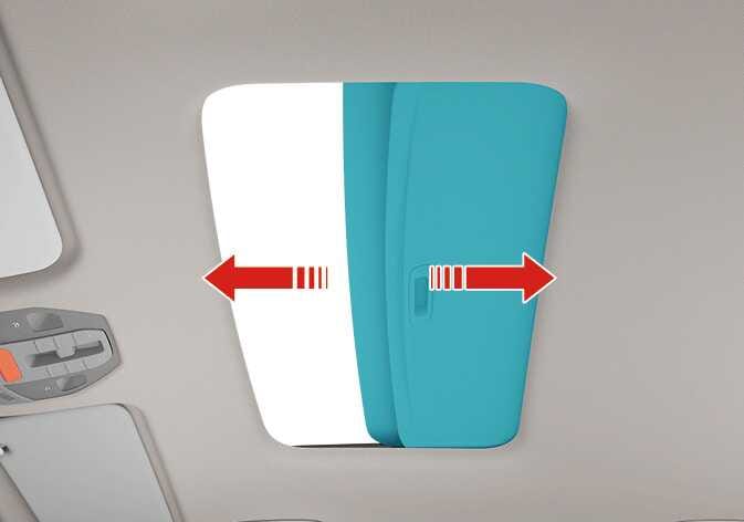 2026 Kia Tasman sunshade operation image. The sunshade is highlighted in teal, and a red double-headed arrow pointing left and right indicates the sliding direction. Explains the function of manually opening or closing the sunshade.