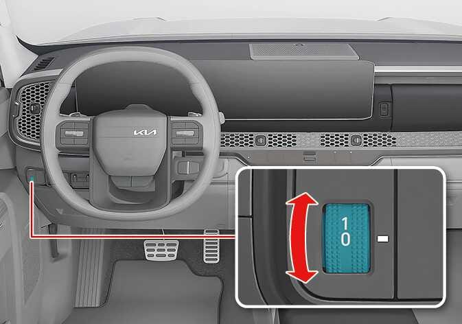 2026 Kia Tasman headlamp leveling adjustment switch image. A red line points from the dashboard to the left of the steering wheel to a detailed view. The close-up shows a teal-highlighted scroll wheel with numbers 0 and 1, and a red double-headed arrow indicating vertical scrolling. This explains the function of adjusting the headlight beam level.