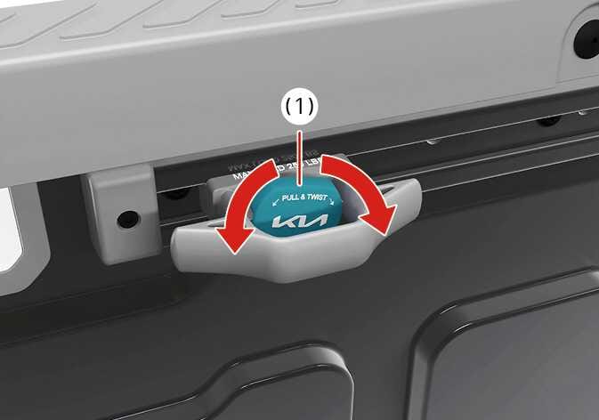 2026 Kia Tasman cleat knob operation image. The cleat knob (1) is highlighted in teal, featuring 'PULL & TWIST' text and the Kia logo. Red curved arrows indicate the direction to rotate the knob left or right. Explains the function of pulling and twisting the knob to release and move the cleat along the rail.