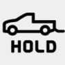 2026 Kia Tasman Tailgate icon. The symbol displays the side outline of a pickup truck with the tailgate open, with the word 'HOLD' printed underneath. Indicates the function to unlock or open the tailgate by pressing and holding the button.