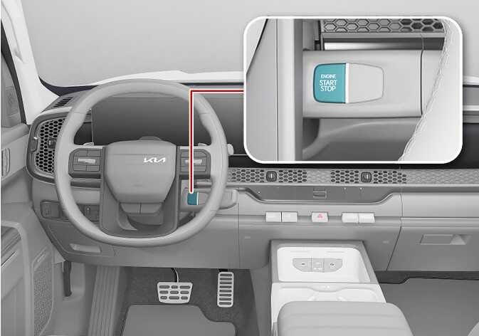 2026 Kia Tasman ENGINE START/STOP button (Type B) image. A red line points to the button behind the steering wheel, shown in a magnified inset highlighted in teal with 'ENGINE START STOP' text. Explains the button's location for turning the vehicle on or off.