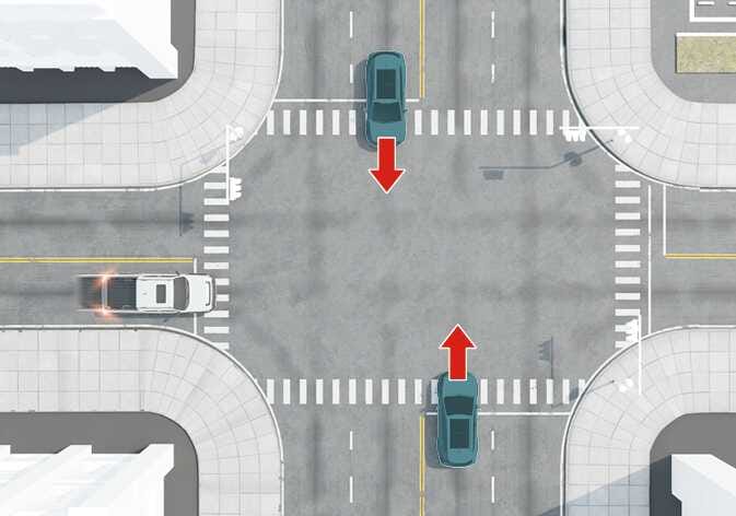 An image of the 2026 Kia Tasman Junction Crossing function. A top-down view shows the subject vehicle at the bottom and an oncoming vehicle at the top with red arrows pointing forward, and a white vehicle approaching from the left. This explains the function that helps avoid collisions with vehicles from the left or right when crossing an intersection.