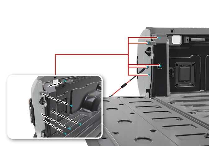 2026 Kia Tasman rear combination lamp retaining screws image. The image shows the open tailgate and highlights two screws in cyan on the side of the lamp assembly. An inset view details the position of these screws. Explains the location of the screws to be loosened for removing the rear combination lamp assembly.