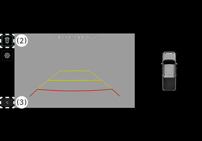 2026 Kia Tasman Rear View Monitor image. The screen displays the rear view with yellow and red parking guidelines and a top-down vehicle view. The View switching button (2) and Back button (3) are highlighted in cyan on the left. This explains the layout and operation of the rear view monitor buttons.