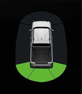 2026 Kia Tasman Reverse Parking Distance Warning cluster display image. A top-down view of the vehicle features a green fan-shaped detection zone highlighted at the rear. This illustrates the warning indicator displayed on the instrument cluster when an object is detected within the 60 to 120 cm range.