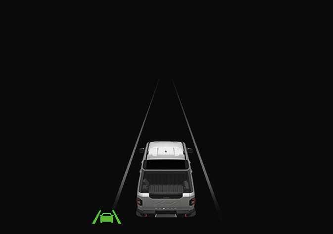 2026 Kia Tasman Driving assist view image. A rear view of the white vehicle is displayed between two white lane lines on the black LCD screen, with a green icon depicting a car between lanes at the bottom left. This explains the function of displaying the operating state of driver assistance systems.