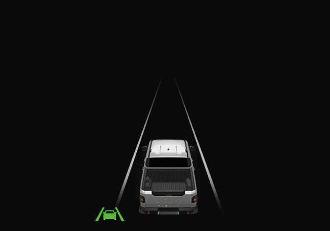 2026 Kia Tasman instrument cluster image showing the lane detected state. A white vehicle is displayed between two white lane lines on a black background, with a green Lane Keeping Assist indicator icon in the bottom left corner. Explains the cluster display when lane markings are detected.