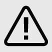 2026 Kia Tasman Master Warning Light icon. It displays a black triangle with an exclamation mark in the center. It functions to alert the driver to a system malfunction or caution requiring attention.