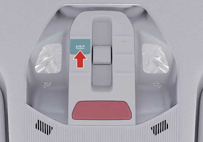 2026 기아 타스만 Kia Connect 버튼 이미지입니다. 오버헤드 콘솔에 위치한 Kia Connect 로고가 표시된 버튼이 청록색으로 강조되어 있고, 굵은 빨간색 화살표가 아래에서 위로 해당 버튼을 가리키고 있습니다. Kia Connect 서비스를 이용하기 위해 조작해야 하는 버튼의 위치를 설명합니다.