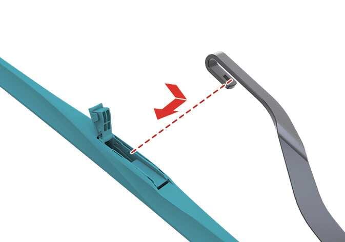 2026 기아 타스만 와이퍼 블레이드 교체 이미지입니다. 청록색으로 강조된 와이퍼 블레이드의 잠금쇠가 세워져 있고, 붉은색 점선 화살표가 와이퍼 암의 고리에서 블레이드를 아래쪽으로 당겨 빼내는 방향을 지시합니다. 잠금쇠를 세운 상태에서 블레이드를 아래로 내려 분리하는 과정을 설명합니다.