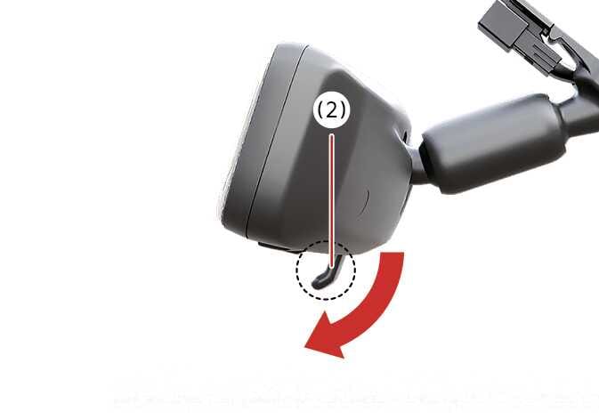 2026 기아 타스만 디지털 센터 미러 모드 변경 이미지입니다. 미러 하단의 모드 선택 레버(2)를 붉은색 굽은 화살표 방향으로 당기는 모습을 나타냅니다. 레버를 끝까지 당겨 디지털 미러 모드로 전환하는 작동 방법을 설명합니다.