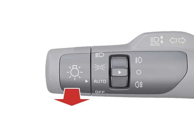 2026 기아 타스만 주행빔 깜박임 조작 이미지입니다. 조명 스위치 레버 표면에 전조등, AUTO, OFF 아이콘이 표시되어 있으며, 굵은 빨간색 화살표가 레버 아래쪽 방향을 가리키고 있습니다. 화살표 방향인 운전자 쪽으로 스위치를 당겨 주행빔을 점멸하는 기능을 설명합니다.