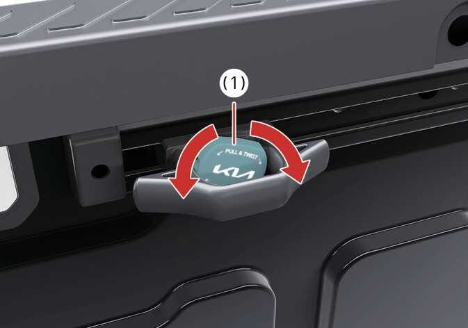 2026 기아 타스만 클릿 노브 조작 이미지입니다. 청록색으로 강조된 클릿 노브(1) 표면에 'PULL & TWIST' 문구가 표시되어 있습니다. 노브 상단에는 좌우 방향의 붉은색 굽은 화살표가 있어 노브를 당긴 후 돌리는 동작을 안내합니다. 클릿을 이동하기 위해 노브를 조작하여 잠금을 해제하는 기능을 설명합니다.