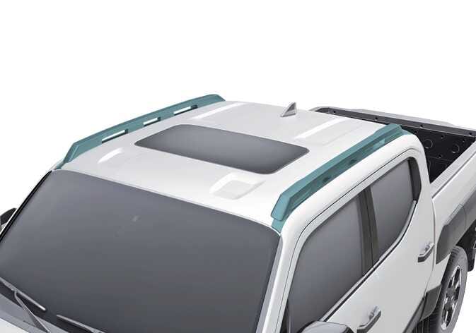 2026 기아 타스만 루프랙 B 타입 이미지입니다. 차량 지붕 양쪽 측면에 청록색으로 강조된 루프랙 바가 설치되어 있는 모습을 보여줍니다. 지붕 중앙에는 선루프가 위치해 있습니다. 루프랙을 이용하여 화물을 적재하거나 액세서리를 장착할 수 있는 위치와 형상을 설명합니다.