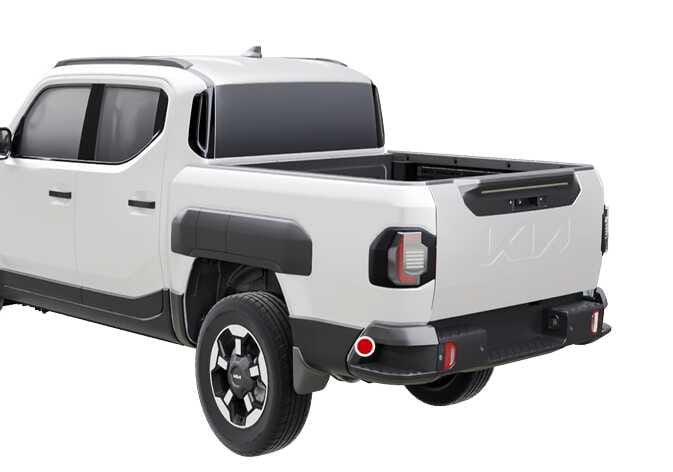 2026 기아 타스만 후측방 초음파센서 이미지입니다. 흰색 픽업트럭의 후면 범퍼 좌측 모서리에 장착된 센서 위치를 붉은색 원으로 강조하여 표시하고 있습니다. 주차 거리 경고 시스템이 작동할 때 차량 후측방의 장애물을 감지하는 센서의 위치를 설명합니다.