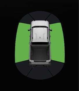 2026 기아 타스만 측방 주차 거리 경고 이미지입니다. 차량 평면도 좌우 측면에 녹색 부채꼴 영역이 표시되어 있습니다. 물체와의 거리가 약 60~120cm일 때 클러스터 화면에 경고를 표시하는 기능을 설명합니다.