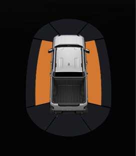 2026 기아 타스만 측방 주차 거리 경고 이미지입니다. 차량 위에서 본 모습으로, 차량 좌우 측면에 주황색으로 강조된 경고 영역이 표시되어 있습니다. 물체와의 거리가 약 30~60 cm일 때 클러스터에 나타나는 경고 표시 기능을 설명합니다.