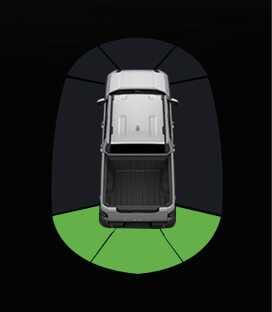 2026 기아 타스만 후방 주차 거리 경고 이미지입니다. 차량 평면도 후방 좌우측 범퍼 영역에 부채꼴 모양의 녹색 경고 표시가 나타나 있습니다. 후방 물체와의 거리가 60~120 cm일 때 클러스터 화면에 나타나는 경고 표시 작동을 설명합니다.