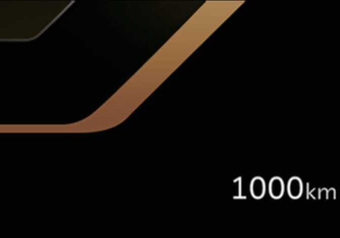2026 기아 타스만 적산 거리계 B 타입 이미지입니다. 클러스터 화면 우측 하단에 '1000km'라는 문구가 흰색으로 표시되어 있습니다. 차량이 주행한 총 거리를 확인하는 기능을 설명합니다.