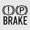2026 기아 타스만 브레이크 경고등 아이콘입니다. 괄호로 감싸진 원 안에 느낌표가 있는 심벌과 알파벳 P가 있는 심벌이 나란히 배치되어 있고, 하단에 BRAKE 문구가 표기된 디자인입니다. 주차 브레이크가 체결되어 있거나 브레이크 액 부족 등 제동 장치에 이상이 감지될 때 점등되는 기능을 설명합니다.