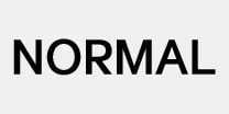 2026 기아 타스만 NORMAL 주행 모드 표시등 아이콘입니다. 검은색의 영문 대문자 NORMAL 텍스트가 표시되어 있습니다. 차량의 주행 모드가 일반 모드 상태임을 나타내는 기능을 설명합니다.