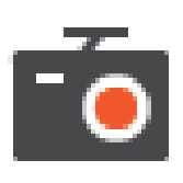 2026 기아 타스만 빌트인 캠 녹화 표시등 아이콘입니다. 검은색 카메라 형상 중앙에 붉은색 원이 위치해 있습니다. 수동 녹화 또는 충격 감지 이벤트 녹화가 진행 중인 상태를 시각적으로 알리는 기능을 설명합니다.